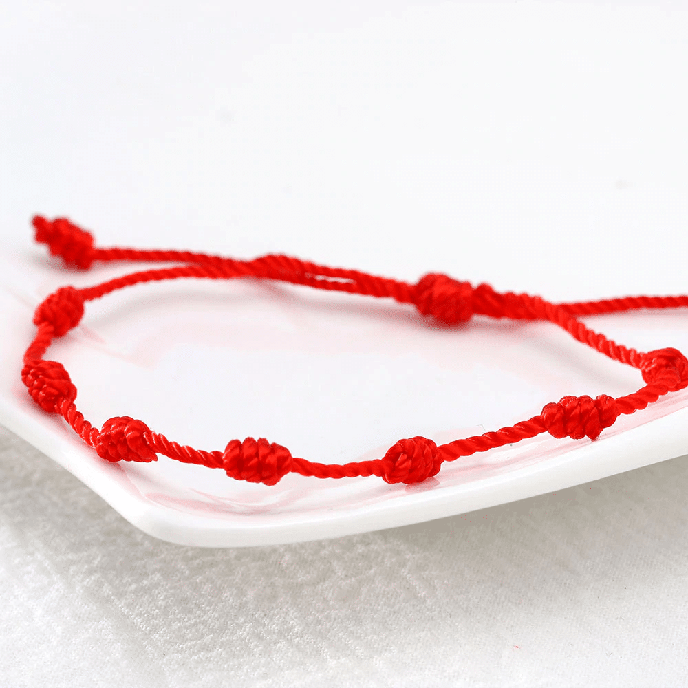 Bracelet-Fil-Rouge-Porte-Bonheur.png